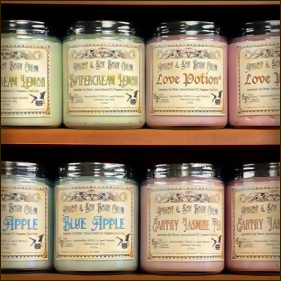 Shelves of Love Potion handmade body creams on display in our shop. These are specifically our apricot and soy cremes in a variety of delicious scents.