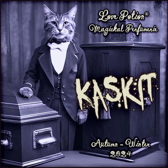Kaskit clean perfume smells of caramel and the inside of a smoky bourbon cask. Label shows a cat in a tux with a coffin.