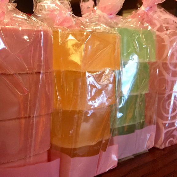 Love Potion handmade soaps wrapped in packs of 4. Each bar is lovingly made with body-friendly ingredients and beautiful fragrances.