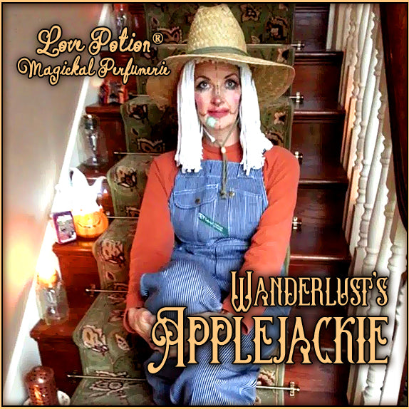 Applejackie is a festive autumn costume party perfume. The label shows a woman dressed as a scarecrow on a staircase.