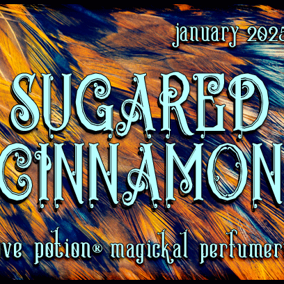 Sugared Cinnamon layerable perfume by Love Potion. Label shows orange and black feathers.