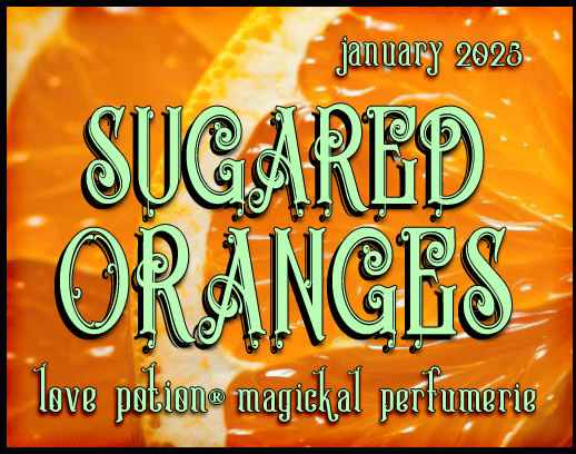 Sugared Oranges layerable perfume by Love Potion. Label shows orange slices.