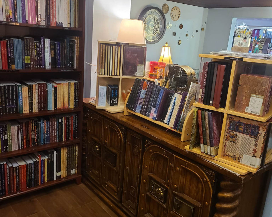 Old fashioned and elaborate handmade journals on display for purchase in the book section of our shop.
