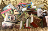 Matchboxes for use with wax burners featuring eclectic vintage artwork