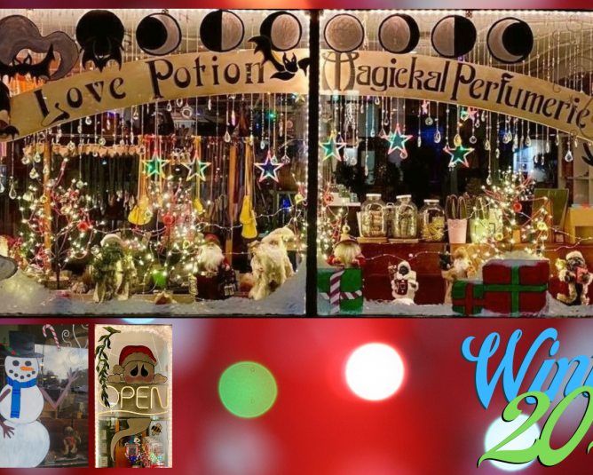Window display for Love Potion Magickal Perfumerie during Christmas, featuring snowmen, ghosts, bats, presents, and more.
