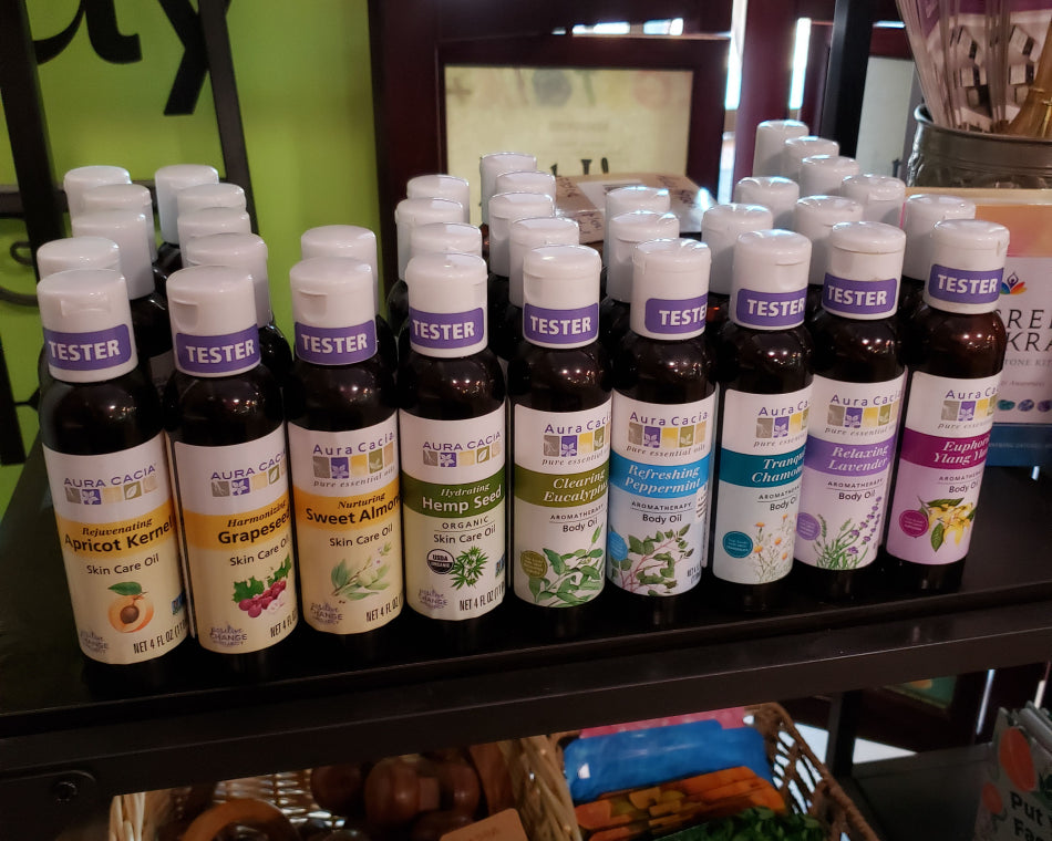 Varieties of Carrier Oils on display in the shop.