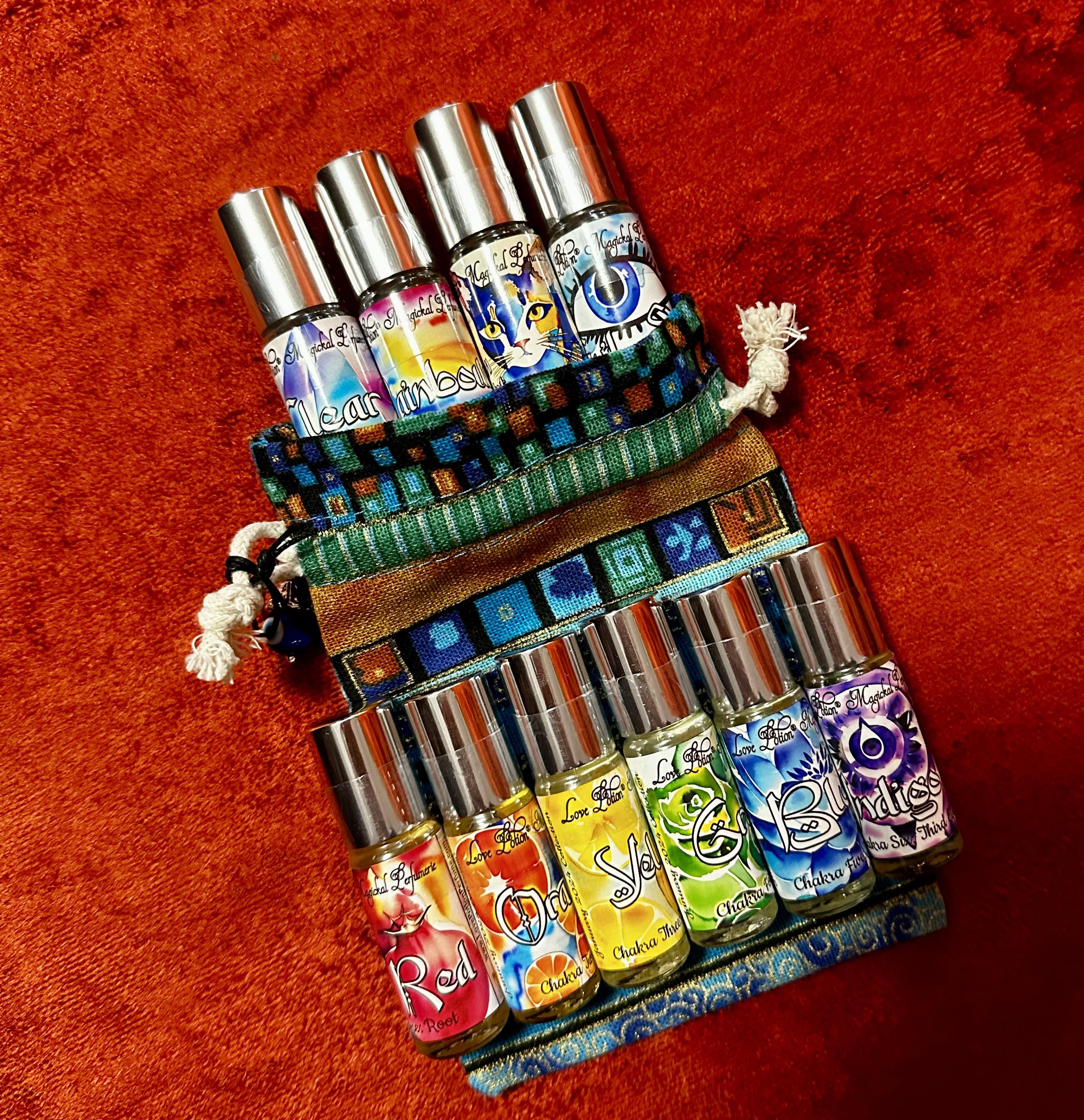 Chakra-inspired perfume potions for balancing and aligning our spiritual bodies. Roll-on oil perfume bottles.