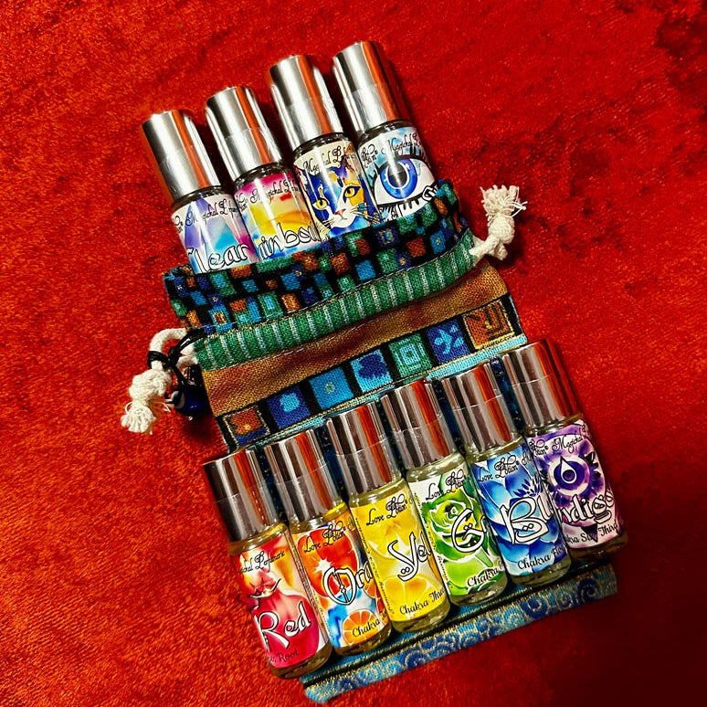 Chakra-inspired perfume potions for balancing, aligning, and protecting chakras. Roll-on oil perfume bottles.