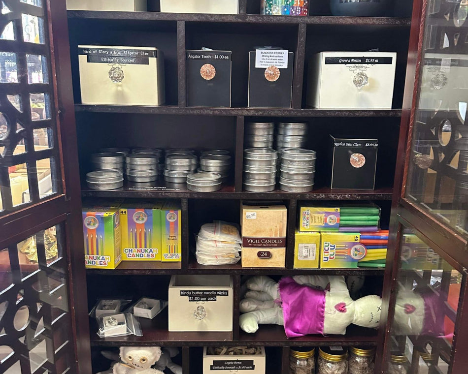 Conjure Cabinet containing a variety of odds and ends used in voodoo and and other religious practices.