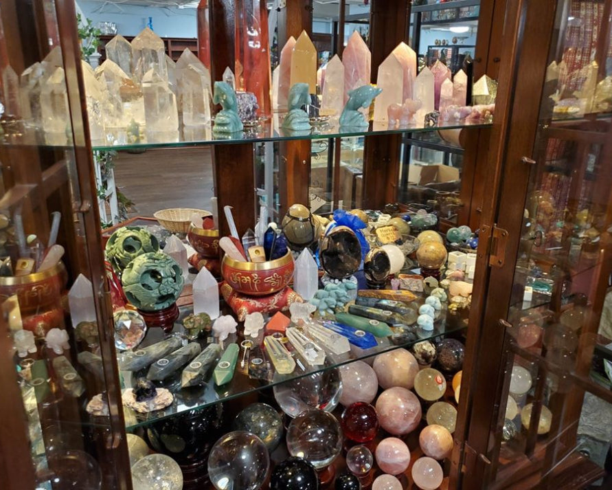 Our large crystal case featuring an array of orbs, points, towers, figurines, and more!