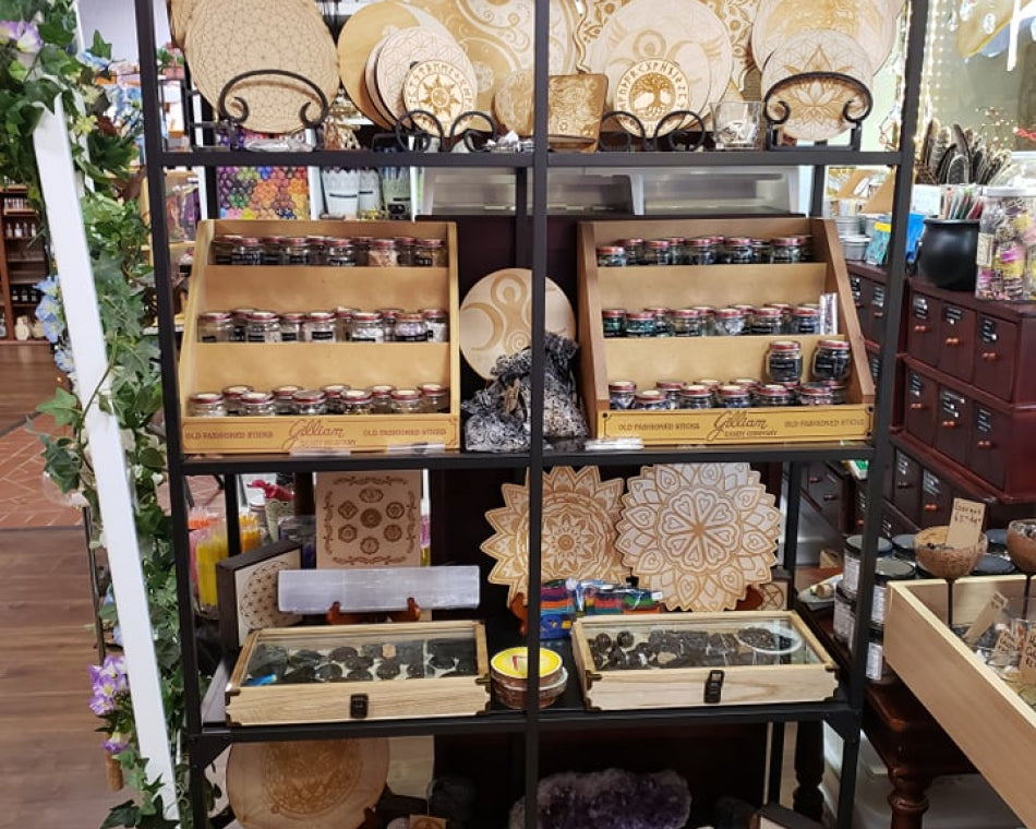 Crystal chips and wooden crystal grids available in various sizes.