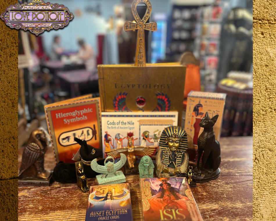 Some of our Egyptian statues, books, decorations, and divination cards on display.