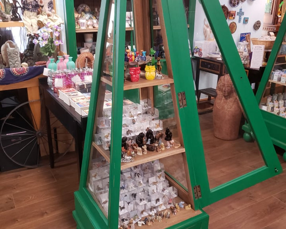 An assortment of adorable spice jars, figurines, and salt and pepper shakers.