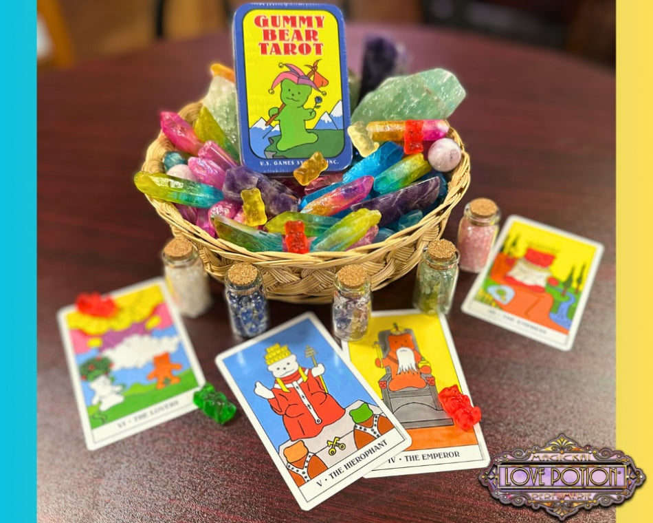 Gummy Bear Tarot deck by Dietmar Bittrich surrounded by sample cards and rainbow crystals.