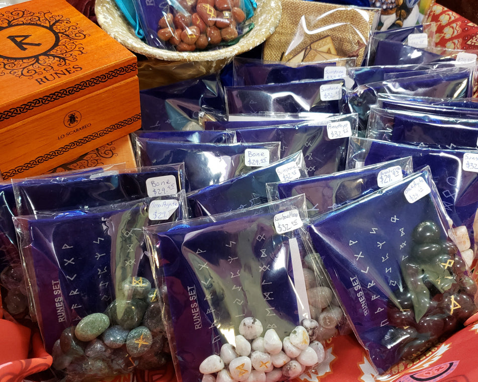Packaged rune sets made with a variety of stones and even bones.