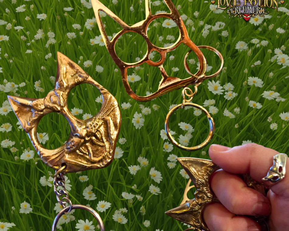 Self-defense tools crafted with two finger holes for a secure grip and sharp "kitty ears" for self-defense purposes.