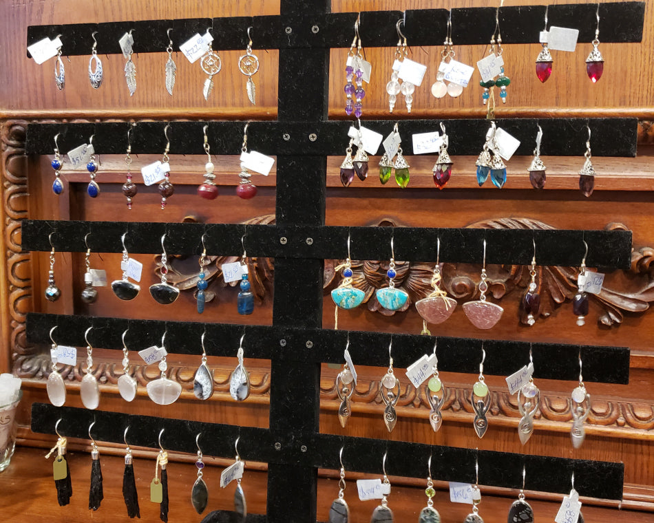 Gorgeous earrings featuring stones and crystals.