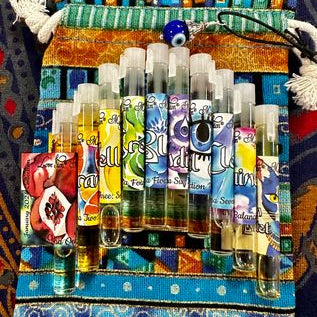 Chakra-inspired perfume potions for balancing, aligning, and enriching chakras. Trial vial oil perfume bottles.