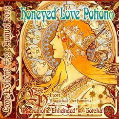 Love Potion perfume label featuring honey-colored Alphonse Mucha artwork of woman's face in profile.