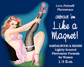 Like a Magnet pheromone oil with sandalwood and resin fragrance label shows a pinup girl in pink and black