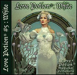 Love Potion: White perfume label featuring art nouveau style artwork of lovely woman in white surrounded by white flowers on pale green background.