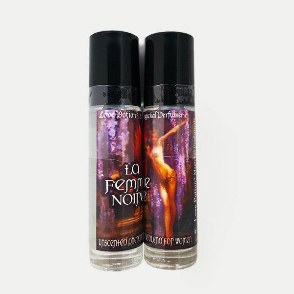 Love Potion Pheromone label for La Femme Noire, featuring painting of beautiful woman performing the Dance of the Seven Veils, on glass product bottles.