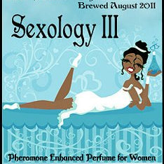 Love Potion: Sexology perfume label, featuring illustration of sexy female smiling on a bed with a potion bottle in hand.