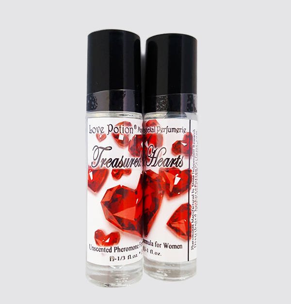 Photo of labelled Treasured Hearts pheromone bottles.