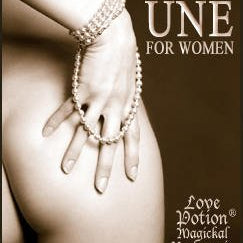Love Potion Une label, featuring a woman's hand wrapped in pearls, touching her naked tushy!