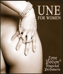 Love Potion Une label, featuring a woman's hand wrapped in pearls, touching her naked tushy!