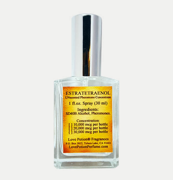 Love Potion Pheromone label featuring text on aged parchment background on a glass spray bottle.