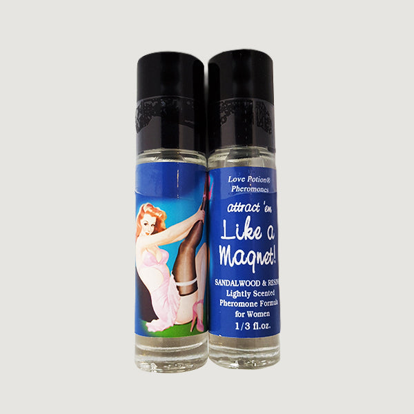 Like a Magnet pheromone oil with sandalwood and resin fragrance in a labeled roll-on application bottle.