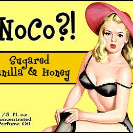 Love Potion: NoCo perfume label, featuring a cute pinup girl looking distressed that she ripped her stockings.