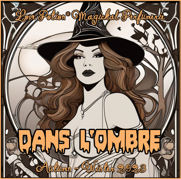 Dans L'Ombre unisex perfume for everyone mixes coffee, chocolate, and vanilla. Label shows a beautiful brunette witch.