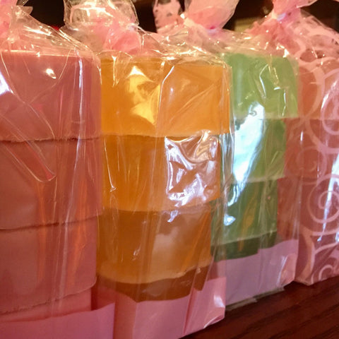 Love Potion handmade soaps wrapped in packs of 4. Each bar is lovingly made with body-friendly ingredients and beautiful fragrances.