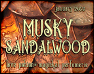 Musky Sandalwood layerable perfume by Love Potion. Label shows bronze leaves.