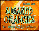 Sugared Oranges layerable perfume by Love Potion. Label shows orange slices.