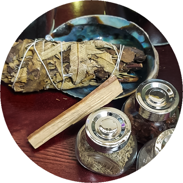 Thumbnail for the apothecary section of our store gallery. Shows smudge wraps and sticks with small jars of herbs and resins.