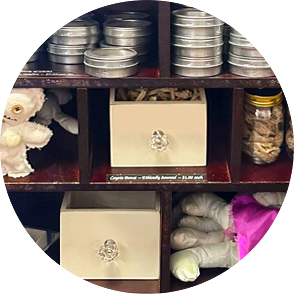 Thumbnail for the Conjure Cabinet section of our store gallery. Shows spell ingredients, voodoo dolls, and other novelty items.