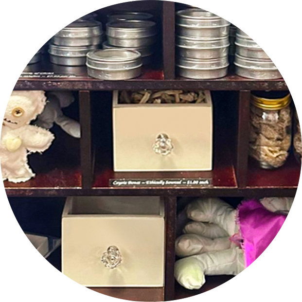 Thumbnail for the Conjure Cabinet section of our store gallery. Shows spell ingredients, voodoo dolls, and other novelty items.