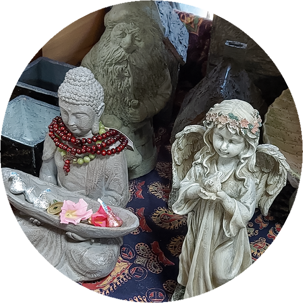 Thumbnail for the garden section of our store gallery. Shows stone statues of Buddha, a gnome, and an angel.