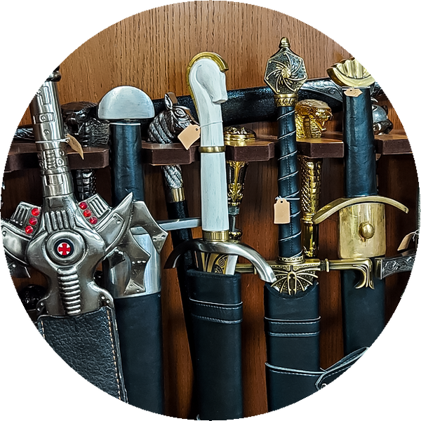 Thumbnail for the armory section of our store gallery. Shows off the hilts of beautiful swords and daggers on display.