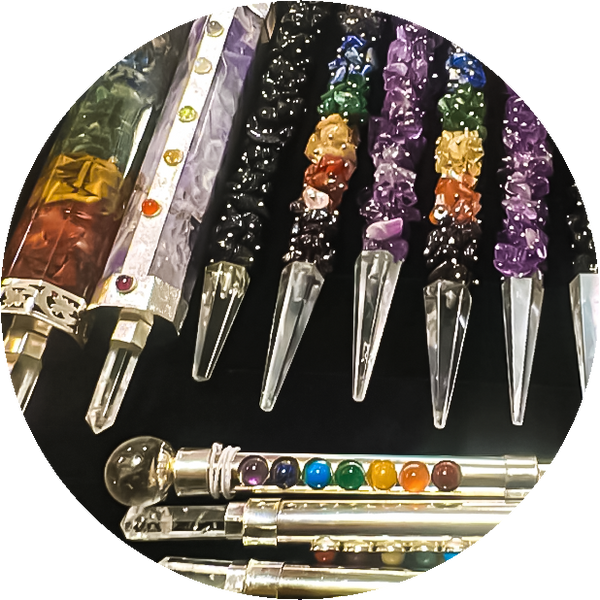 Thumbnail for the wand section of our store gallery. Shows crystal wands for chakra work in a display case.