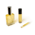 Perfume bottles in a variety of shapes and sizes, including oil perfume and trial size vials.
