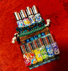Chakra-inspired perfume potions for balancing, aligning, and empowering chakras. Roll-on oil perfume bottles.