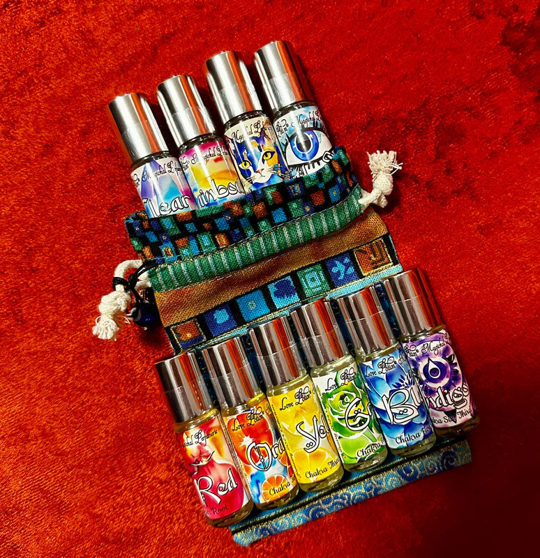 Chakra-inspired perfume potions for balancing, aligning, and empowering chakras. Roll-on oil perfume bottles.