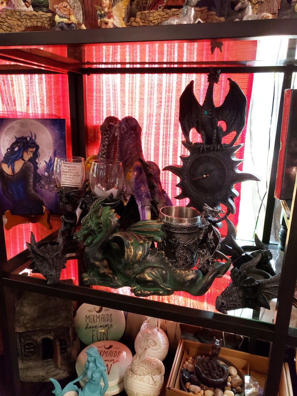 A wide variety of dragon pieces available. This is an image of dragon items on a shelf.