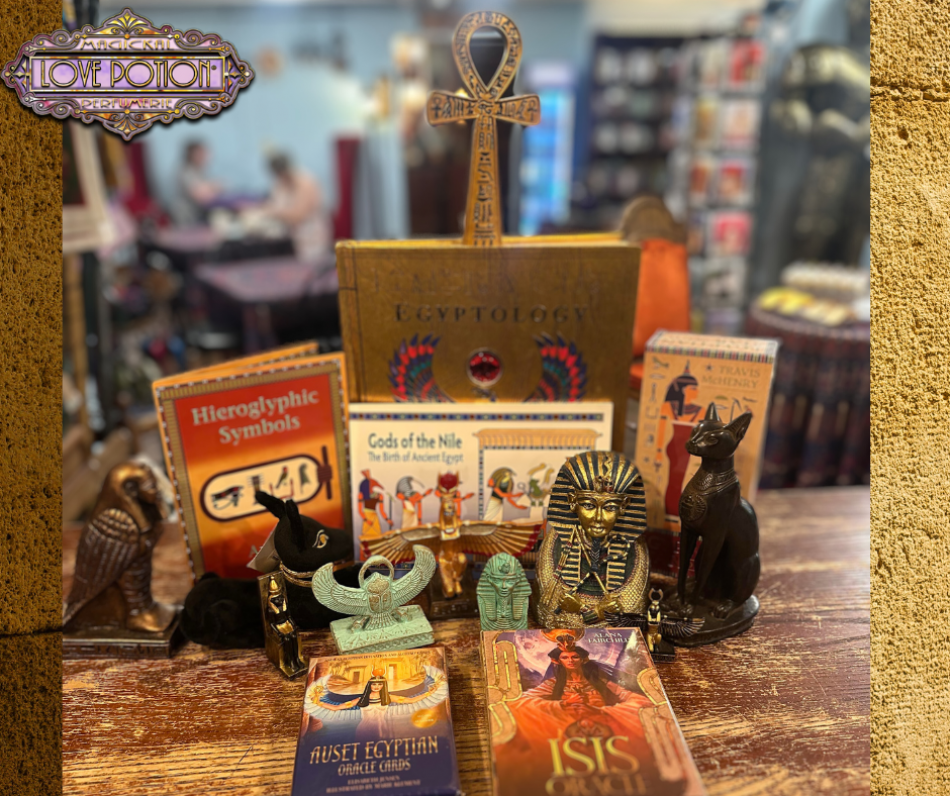 Some of our Egyptian statues, books, decorations, and divination cards on display.