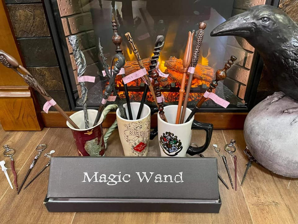 The picture showcases Harry Potter-inspired cups and wands neatly arranged in front of a cozy fireplace.