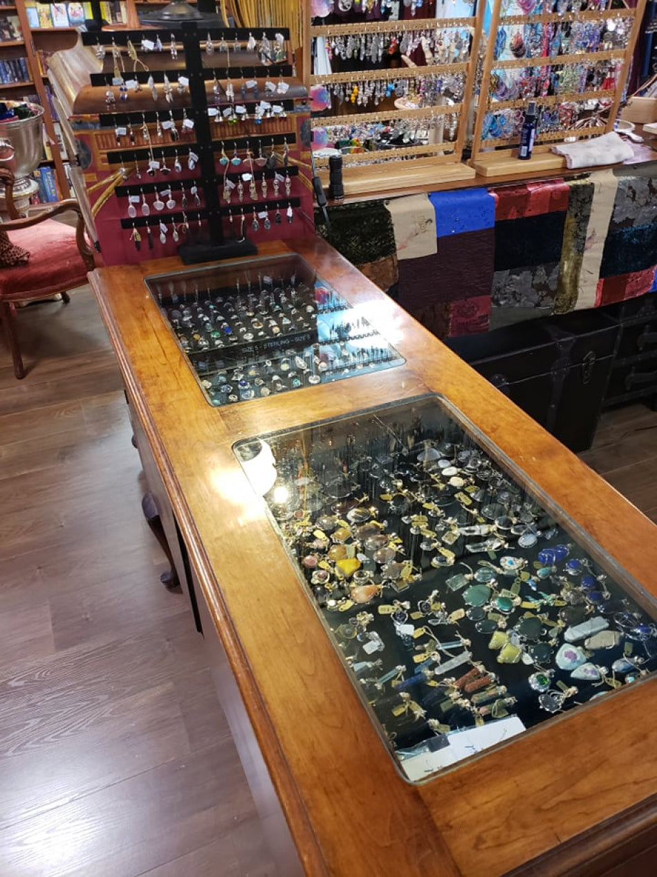 Our ring case is a lovely wooden counter with drawers and glass on top to look down onto the rings.